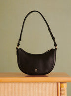 SAULA LEATHER HALF MOON BAG PETITE MENDIGOTE