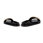 Naria Black Comfort Slide sandals with a stylish gold strap, offering casual elegance and comfort.