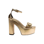 Naria Gold Platform Ankle Sandal featuring golden leather, embroidered embellishment, and a 120mm heel.