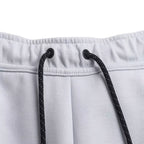 Pantalones deportivos Tech Fleece - Gris y blanco