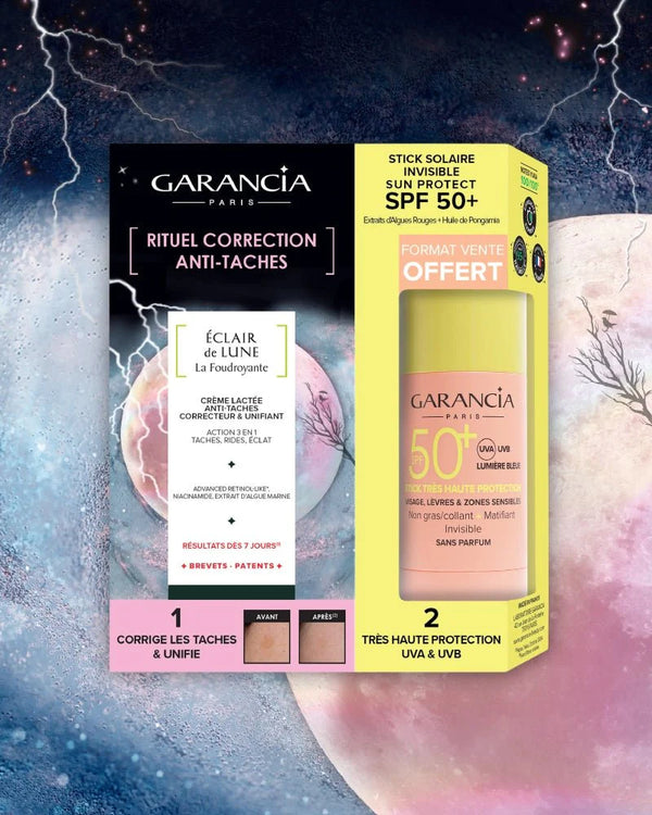 Garancia Anti-Dark Spot Correction Ritual Set including Éclair de Lune La Foudroyante milky cream and the free Sun Protect SPF 50+ Invisible Sun Stick, presented on a cosmic background with lightning.