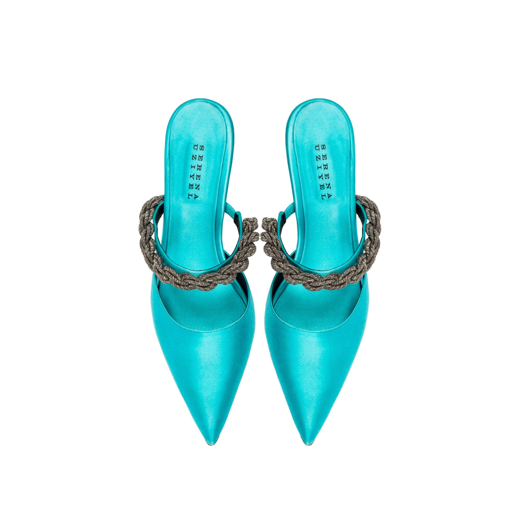 Roxana Aqua Mules Pump featuring a vibrant turquoise design and stylish braided strap detail.