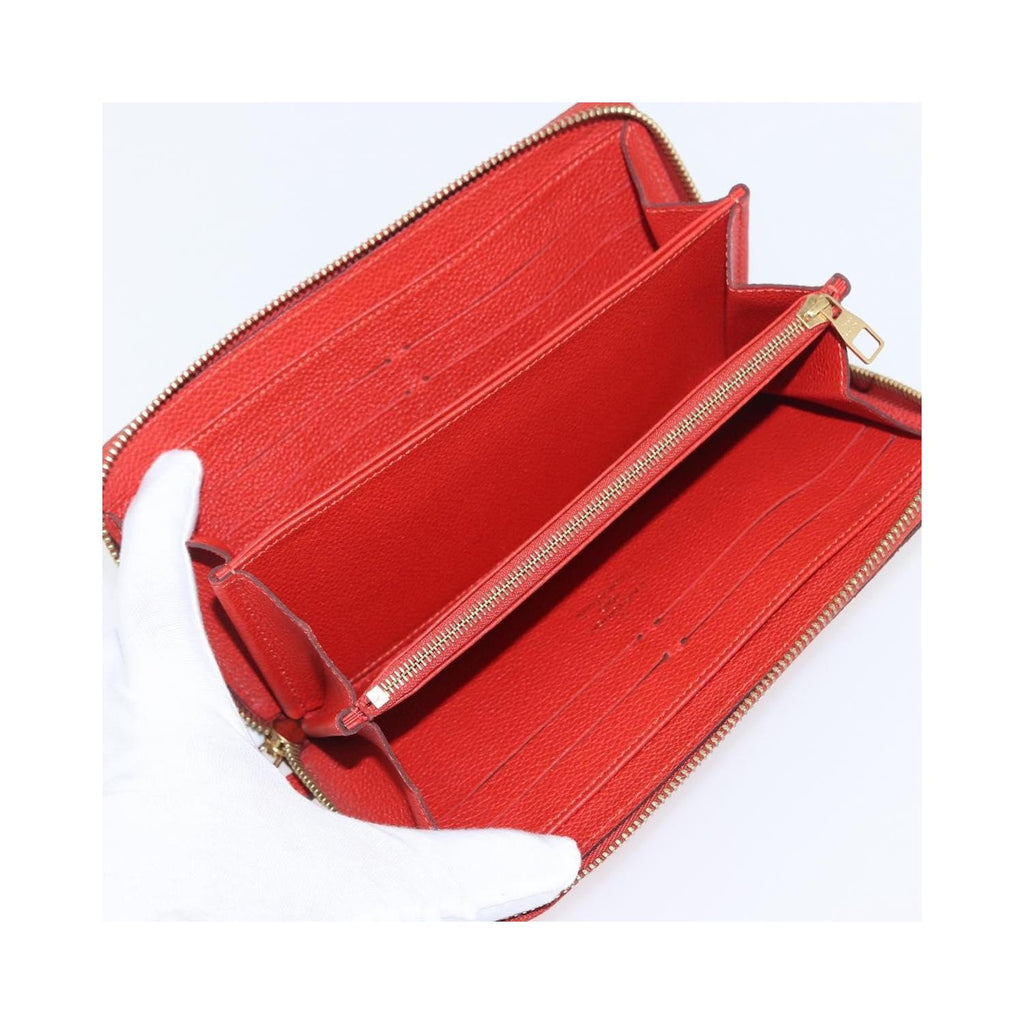 Louis Vuitton - Portefeuille Portefeuille Zippy Monogramme Empreinte Cuir - Orange