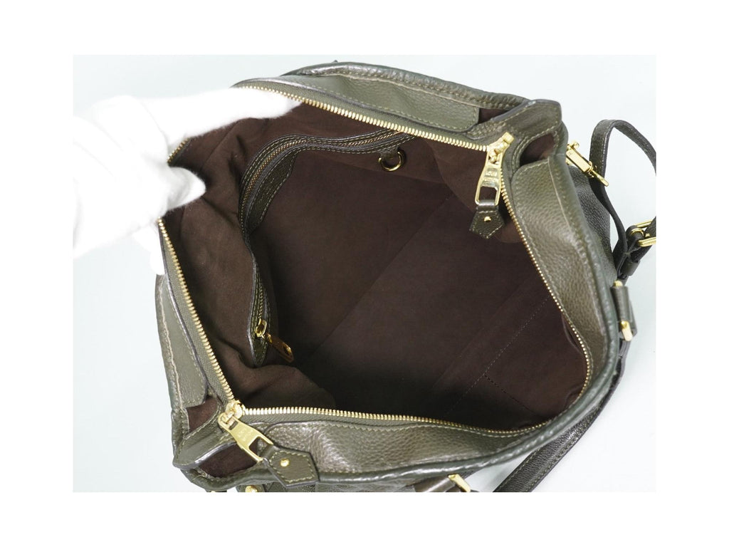 Louis Vuitton – Skórzana torebka do ręki Stellar PM – Khaki