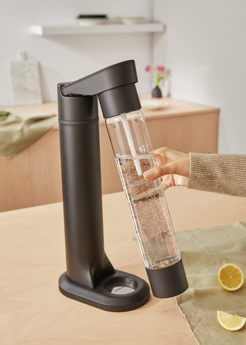 Soda Maker Studio - Sparkling Water Machine + 1L Bottle - Black