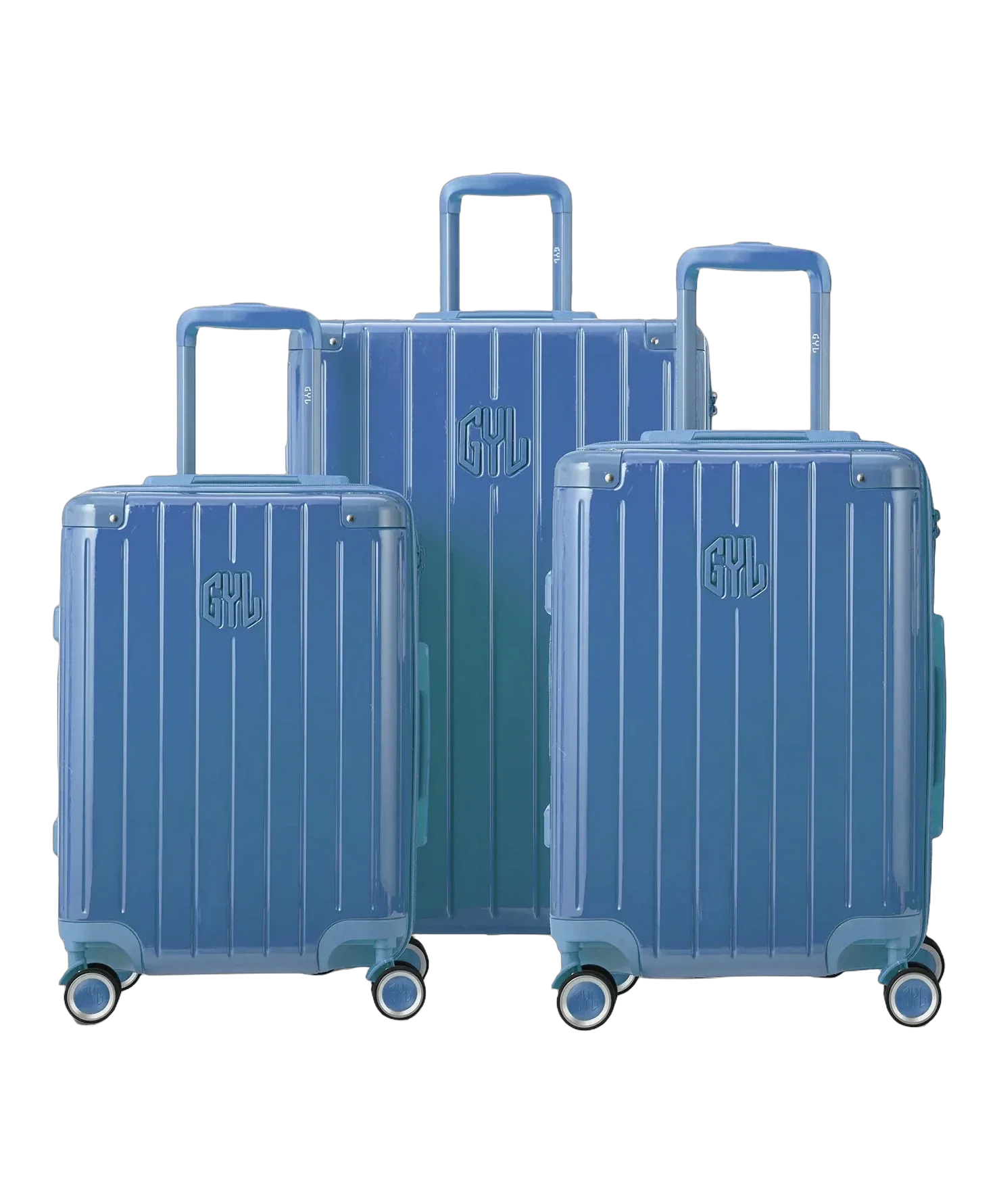 Set of 3 rigid Intemporelle polycarbonate suitcases in grey-blue, front view with GYL logo