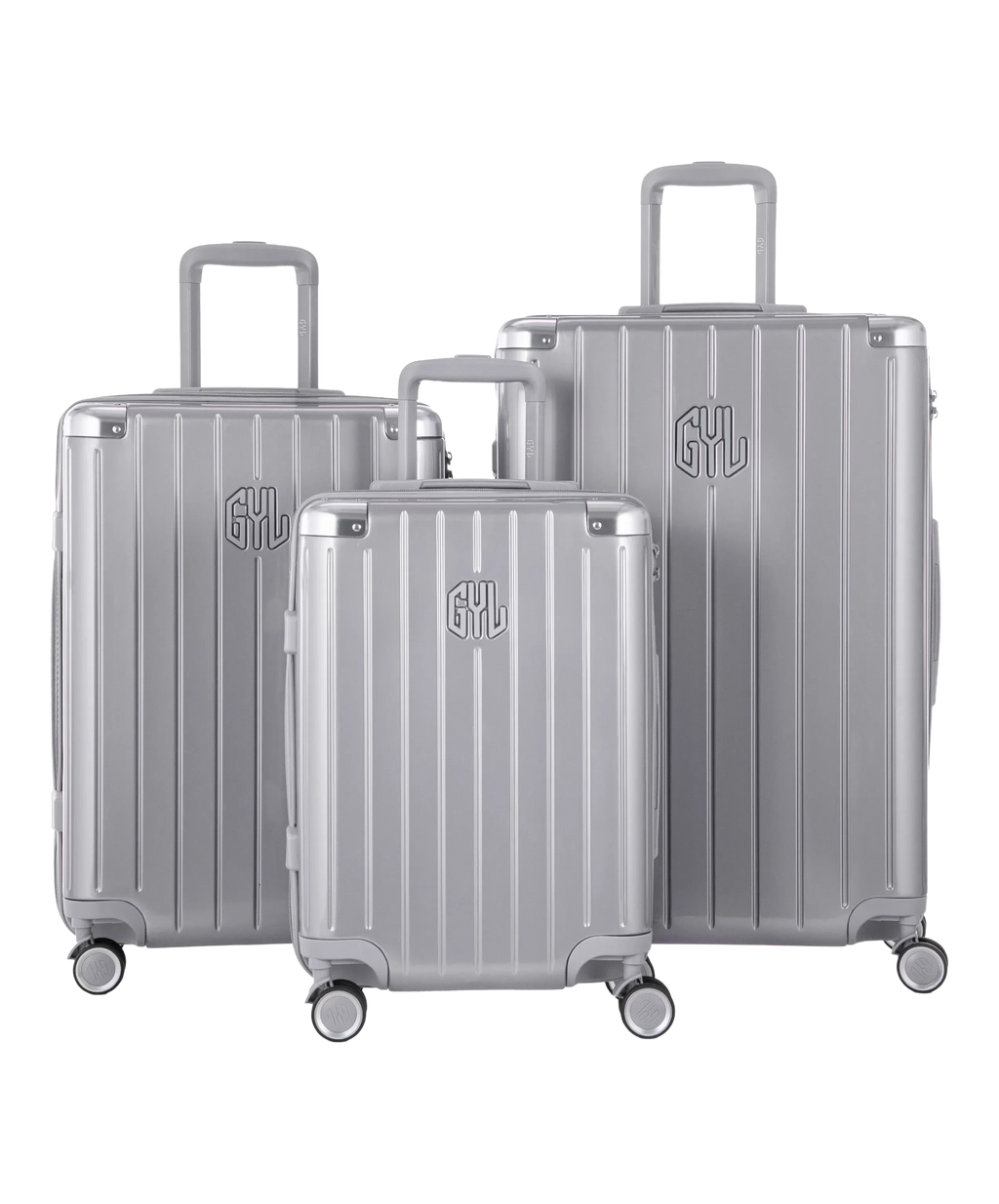 Intemporelle polycarbonate luggage set of 3 cabin, medium and large suitcases in silver, front view of the complete set