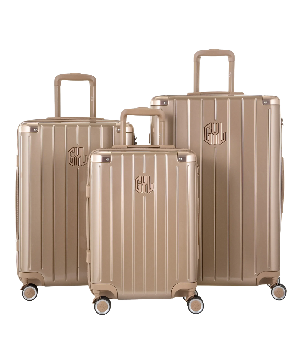 Intemporelle polycarbonate suitcase, set of 3 cabin, week and hold suitcases in champagne, front view of the complete set