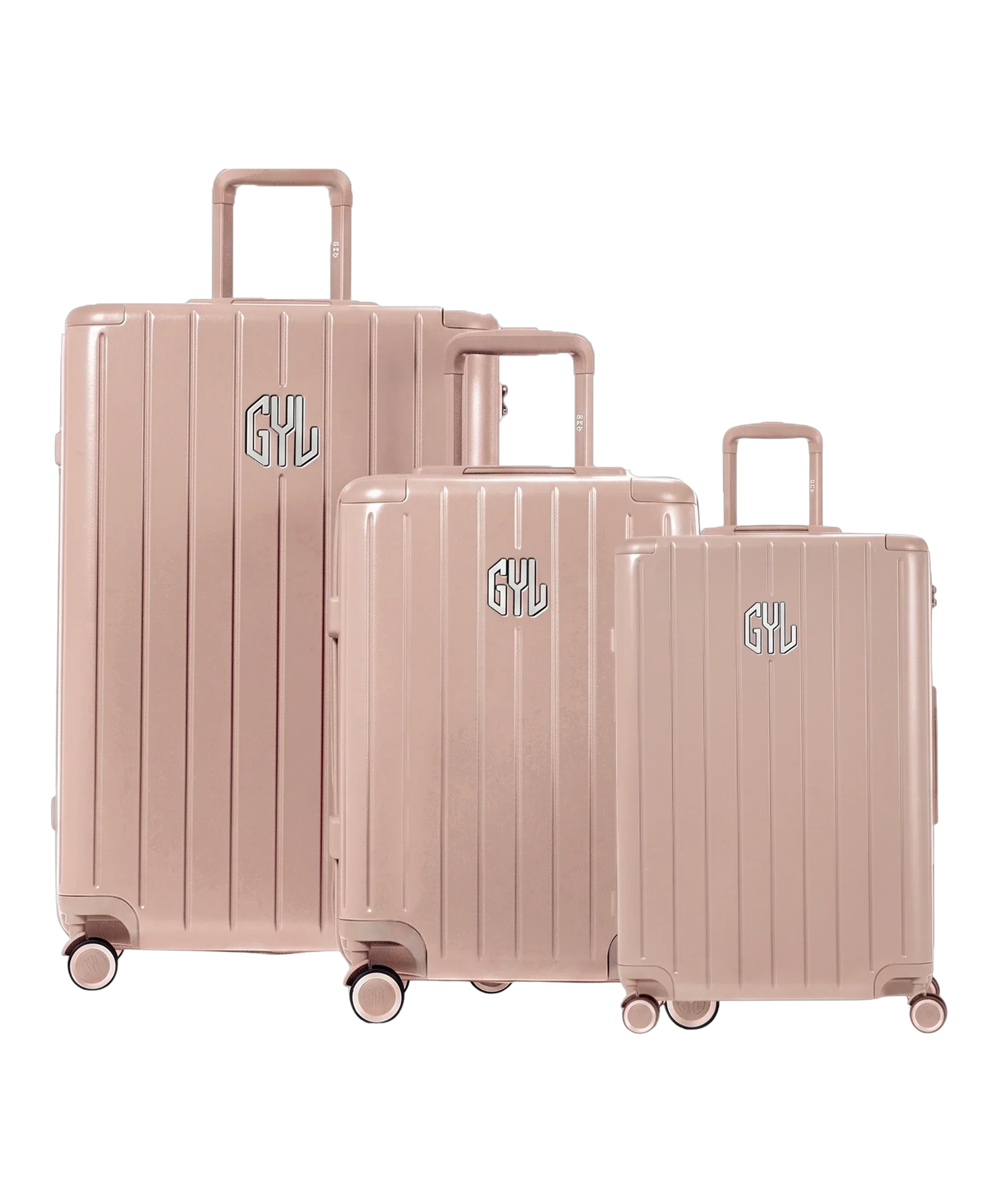 Set of 3 rigid GYL Intemporelle nude suitcases with ribbed shells and telescopic handles. #couleur_nude