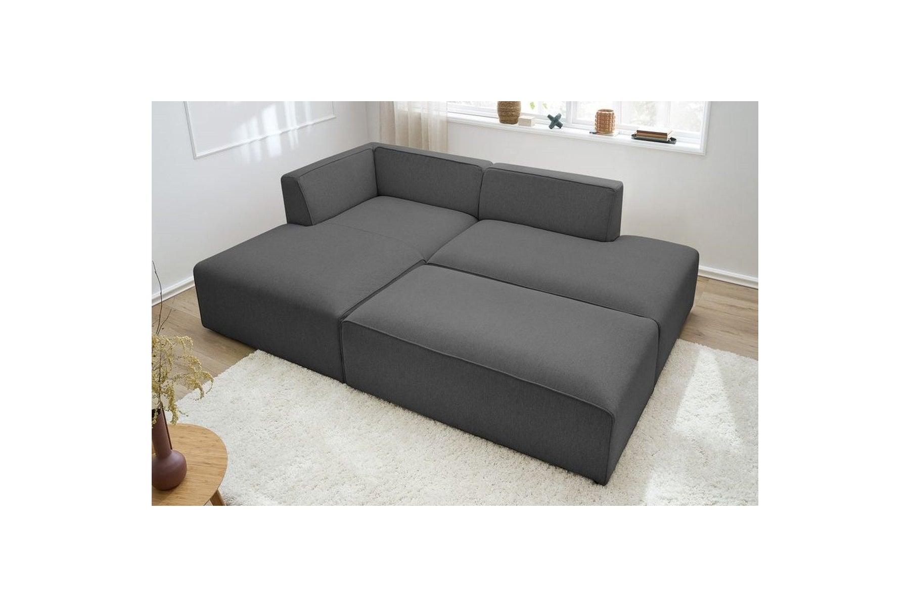 Canapé d'angle fixe modulable MEGEVE tissu lisse avec pouf - Angle gauche - BOBOCHIC - The Bradery